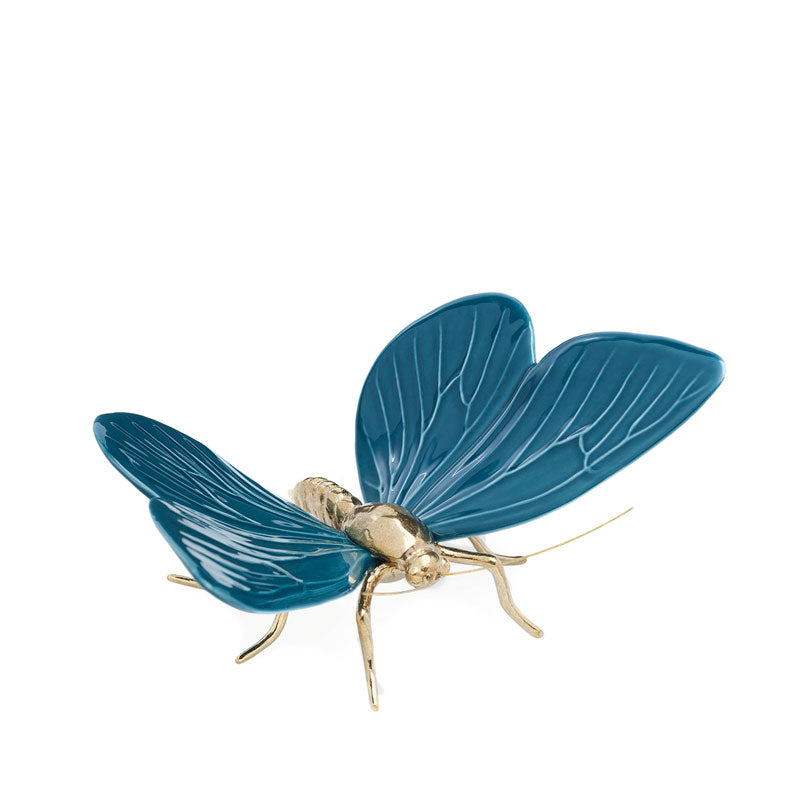 borboleta em cerâmica azul da marca laboratório de estórias