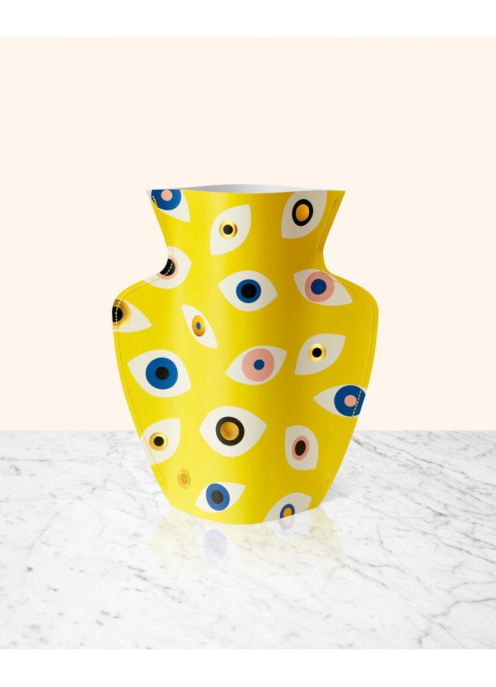 vaso de papel da marca Octaevo com padrão geométrico amarelo