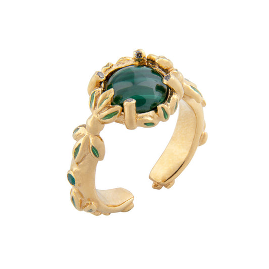 anel Carolina Curado com folhas verde e pedra esmeralda