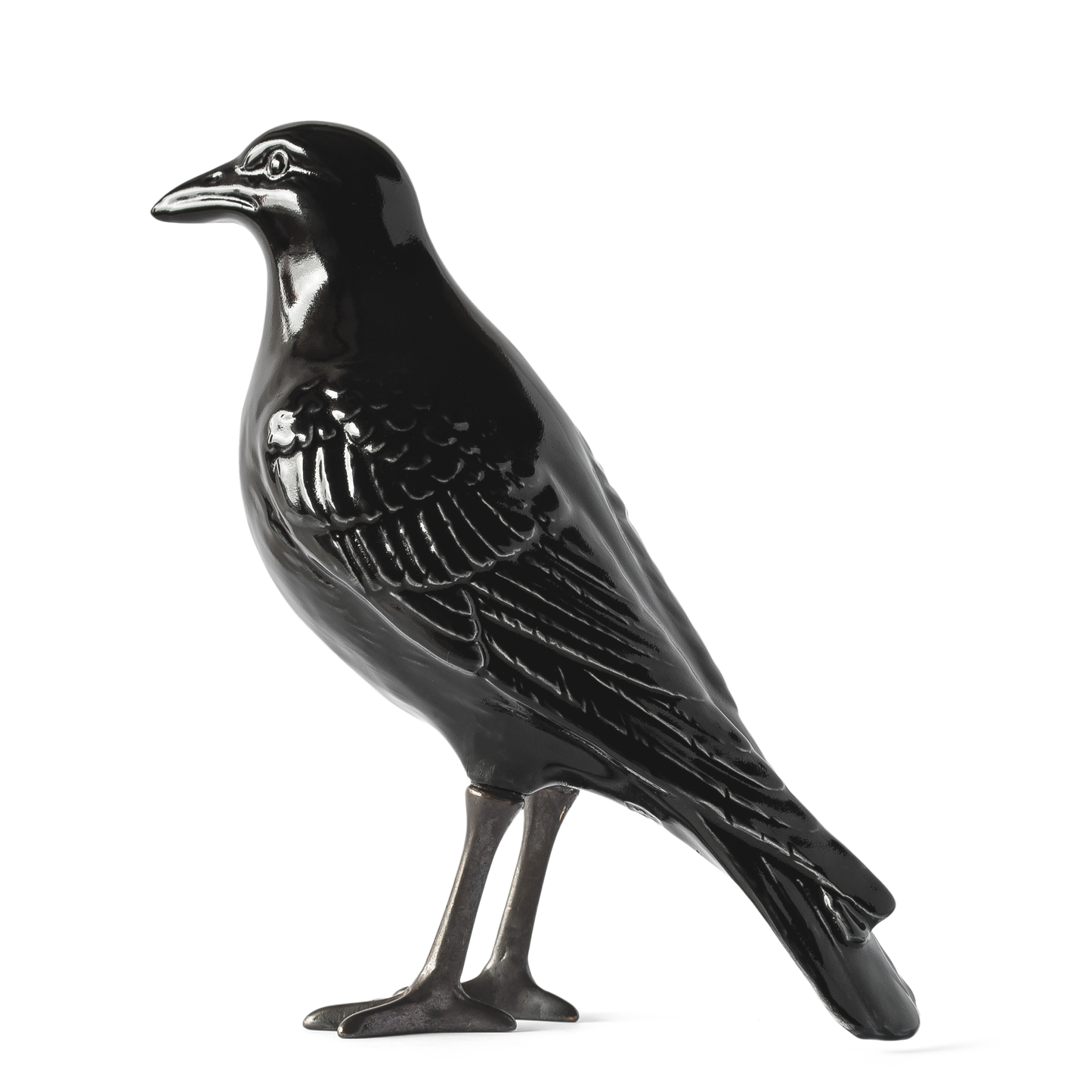 corvo preto em cerâmica com patas em latão oxidado da marca Laboratório de estórias