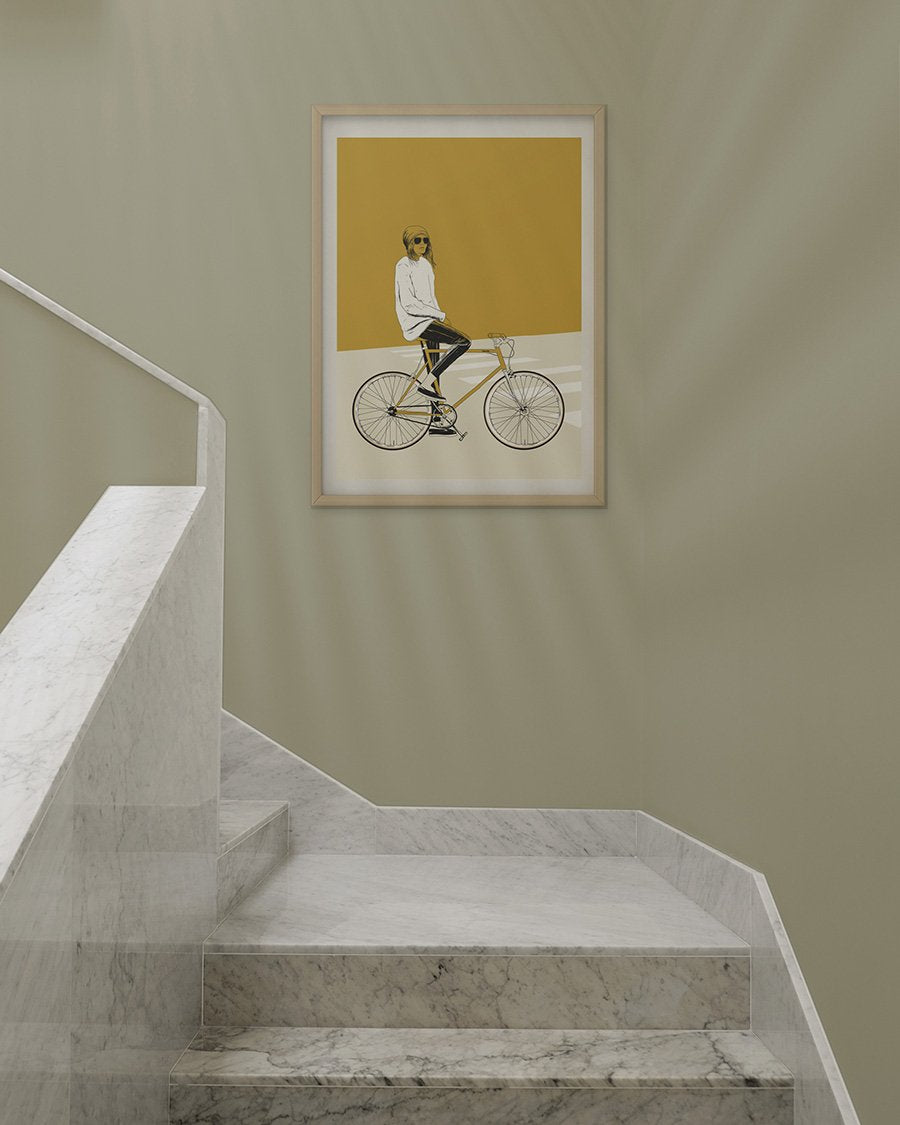 decoração com ilustração de mulher a andar de bicicleta amarela